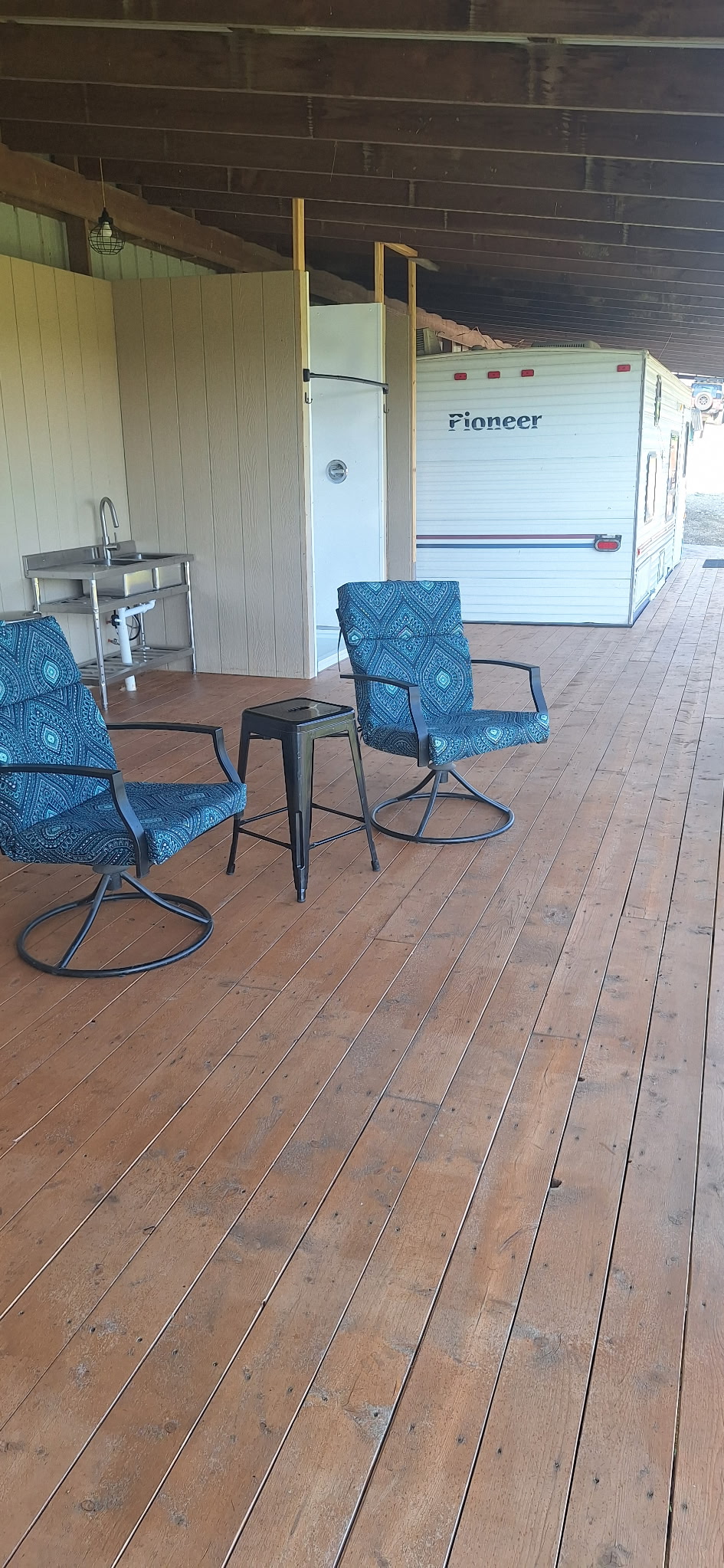 Sunrise Silo camper retreat with covered deck